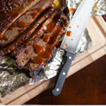 The ultimate guide to smoking your first brisket. Don't rely on fancy rubs, all you need is salt, pepper and these techniques!