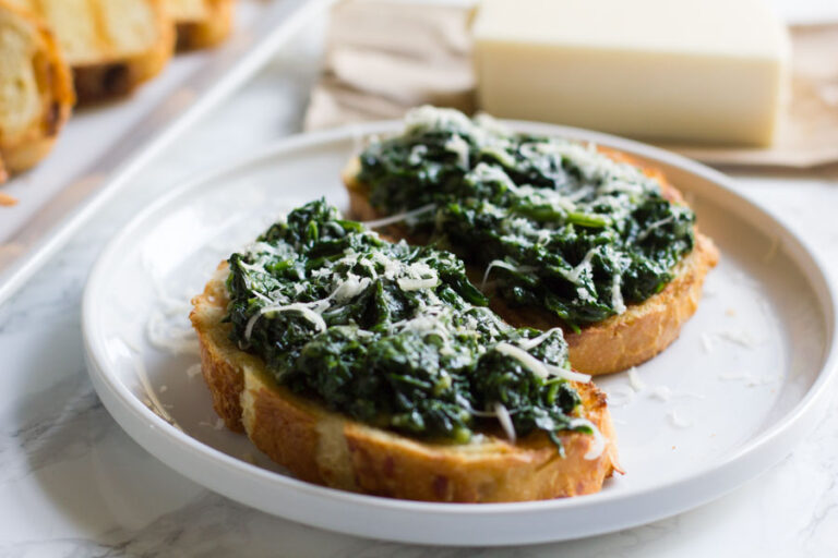 Spinach Asiago Bruschetta. It's the perfect appetizer to any meal and takes only a few minutes to prepare!