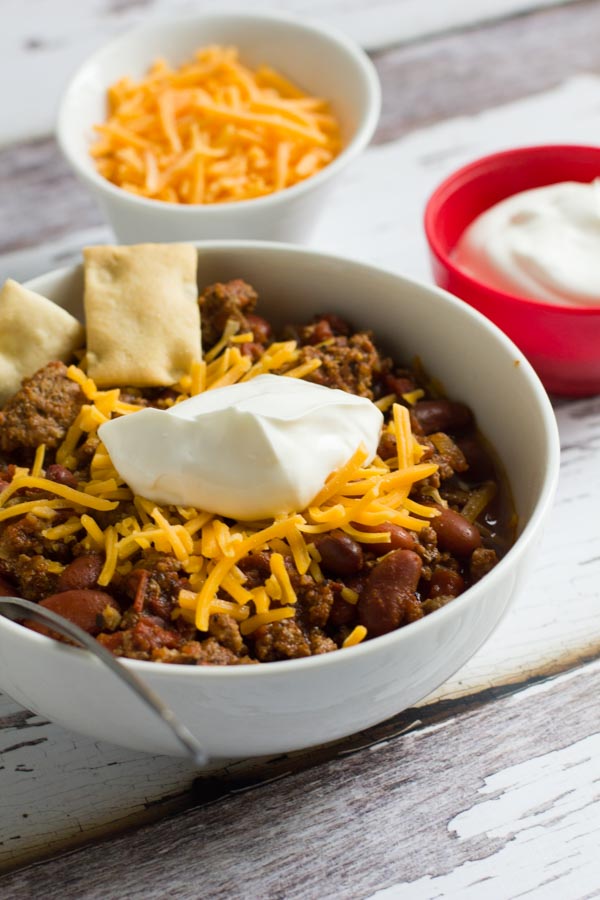 This easy set-and-forget slow cooker chili is perfect year round, whether it's game day, a cold winter's day or a summer cookout.