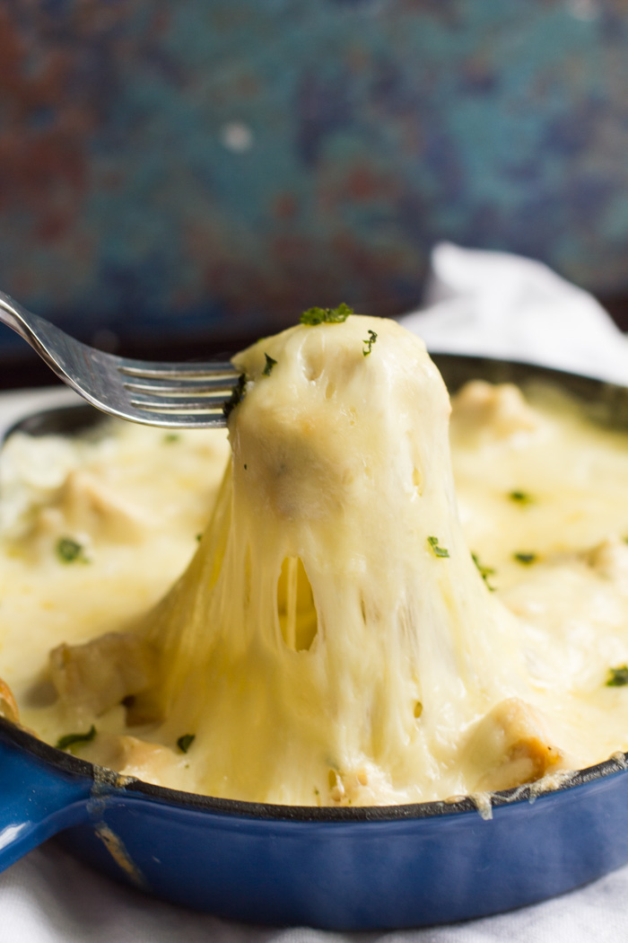 A delicious Tex-Mex appetizer, queso flameado is a warm bowl of cheese and meat served in tortillas.