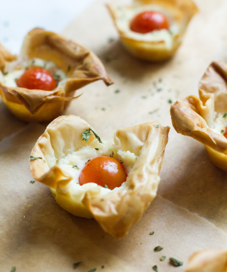 These fun tomato ricotta phyllo cups are really easy to prepare and make the best appetizer for your next party or brunch.