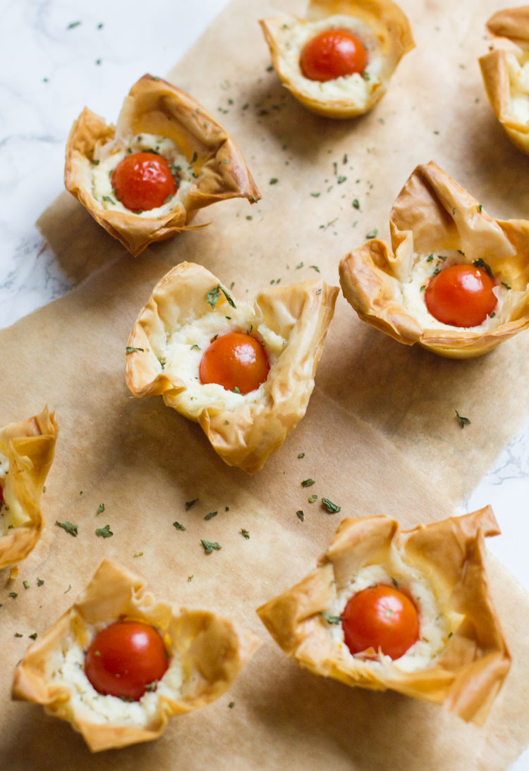 These fun tomato ricotta phyllo cups are really easy to prepare and make the best appetizer for your next party or brunch.