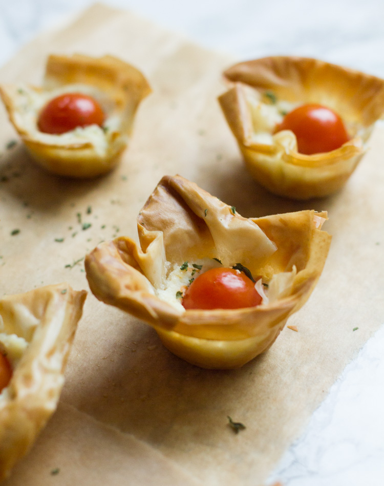 These fun tomato ricotta phyllo cups are really easy to prepare and make the best appetizer for your next party or brunch.