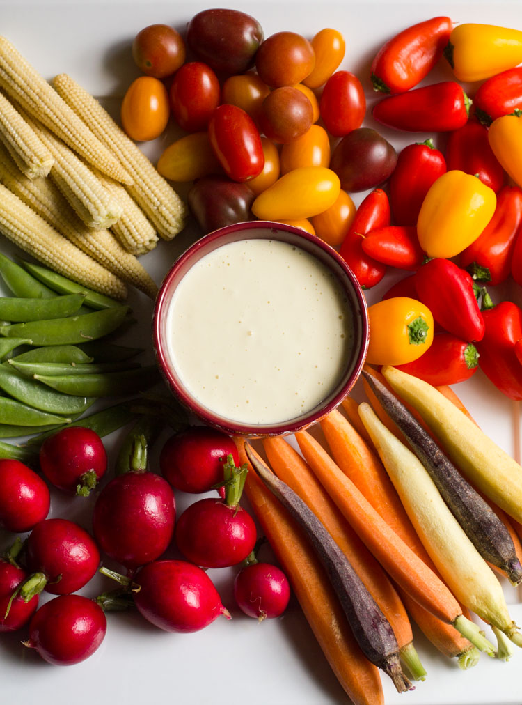 This 5 minute garlic aioli is super easy and flavorful. Perfect as a dip for veggies and fried potatoes or a spread for sandwiches.