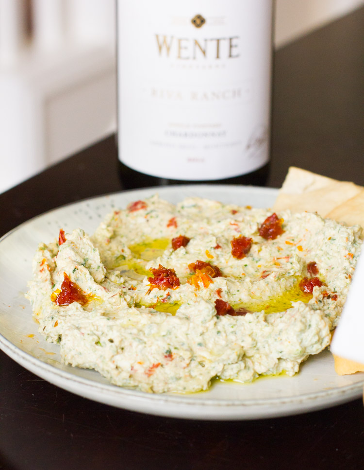 This whipped feta dip with spinach and sundried tomatoes is the perfect party dip for a small or large gathering and pairs wonderfully with a glass of white wine.