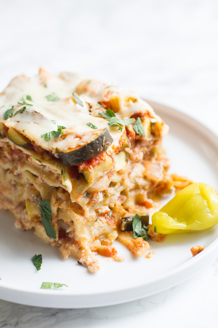 This crock pot vegetable lasagna makes for an easy dinner with bright, fresh, notes of zucchini, squash and peperoncini.