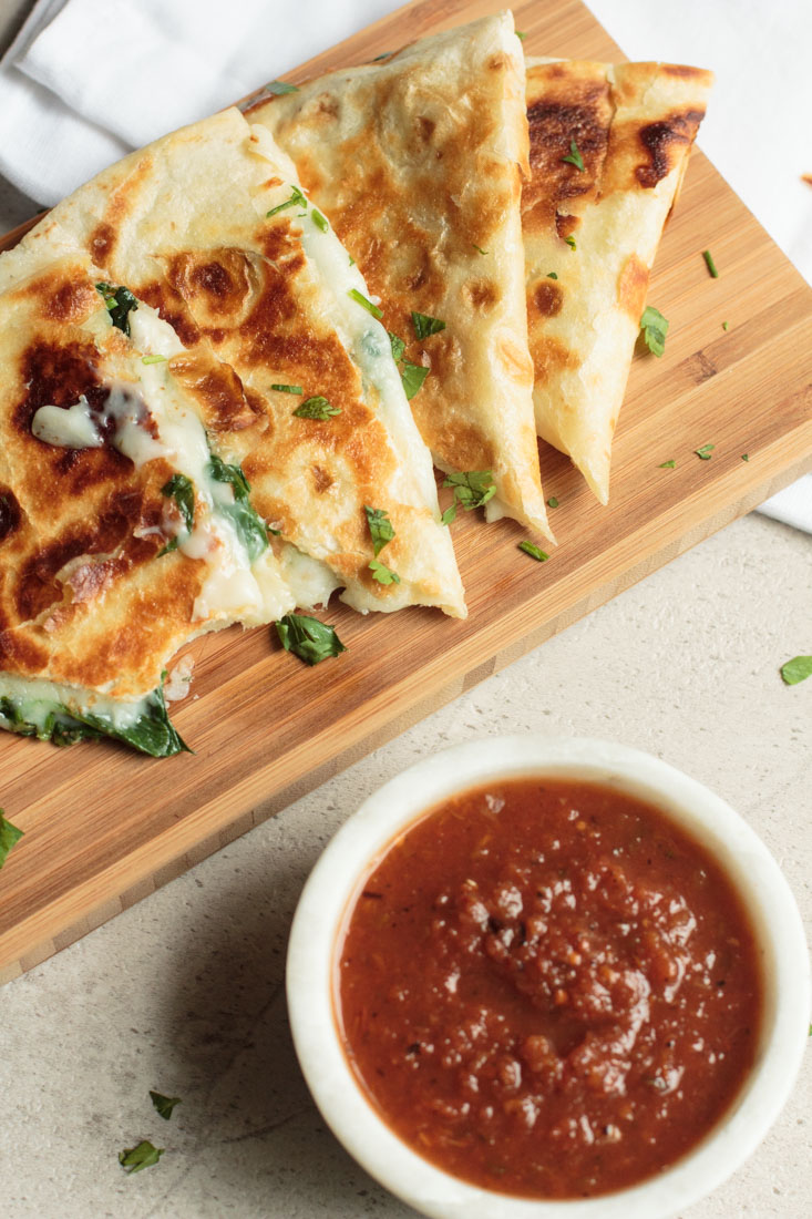 These Spinach Quesadillas are gooey, cheesy and incredibly easy to prepare. From stove to table in less than 5 minutes!