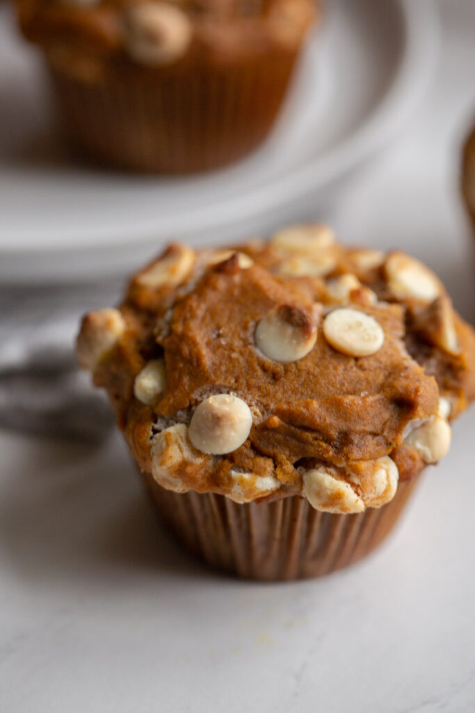 bakery style white chocolate chip pumpkin muffins