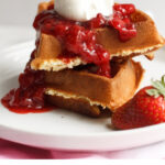 Find out how to make homemade waffles and strawberry syrup, a classic sweet breakfast for your sweetie. Perfect for Valentine's Day, Mother's Day, Birthday Breakfasts, or a large waffle bar for a brunch or party!