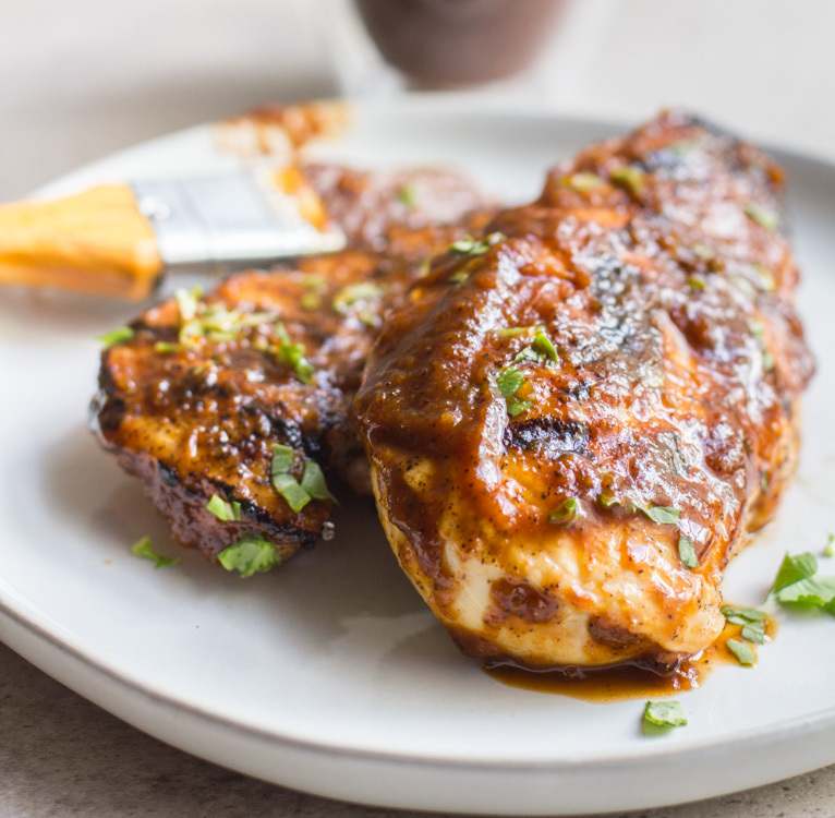 plate with chicken and bbq sauce