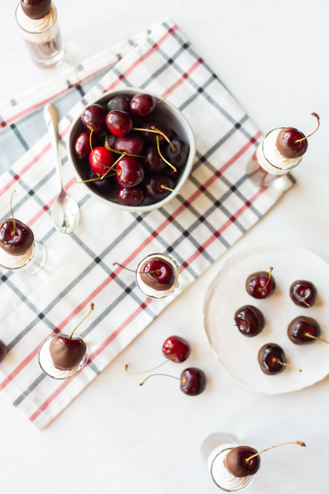 wine soaked choclate covered cherries on a table