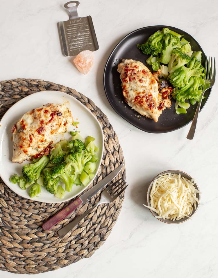 spinach artichoke stuffed chicken on a plate