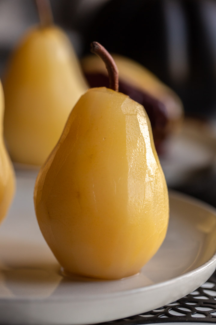 easy poached pears on a plate