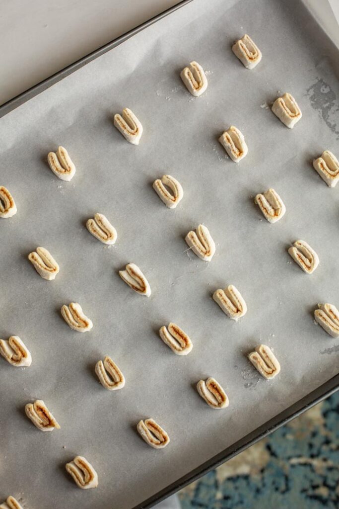 raw pumpkin spice palmiers on a sheet pan