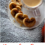 Pumpkin Spice Palmiers are flaky cookies, subtly sweet and full of pumpkin spice flavor! They're perfect on a rainy day with a warm cup of coffee.