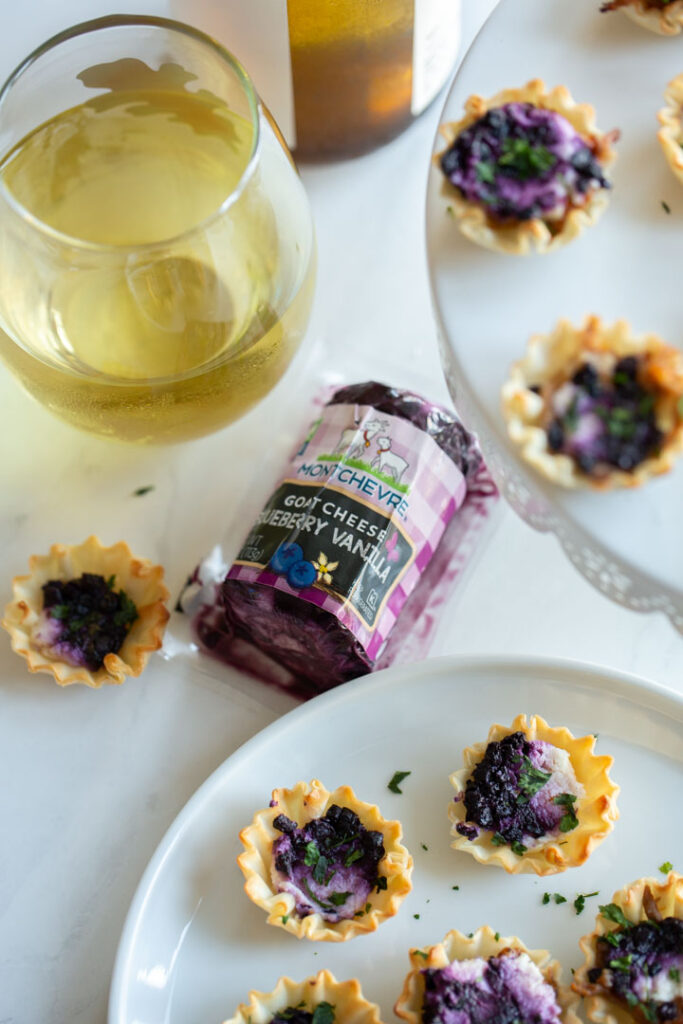 blueberry goat cheese appetizer on a serving dish