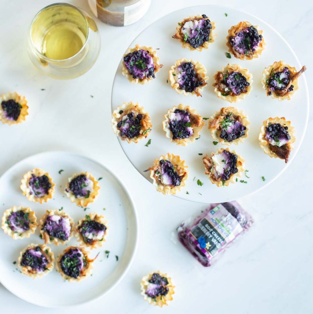 blueberry goat cheese appetizer bites on a plate