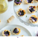 #AD This easy holiday appetizer uses minimal ingredients and yields maximum flavor. Blueberry Goat Cheese Appetizer bites are flaky, delicious and packed with pulled pork and blueberry vanilla goat cheese. #montchevreisgoat