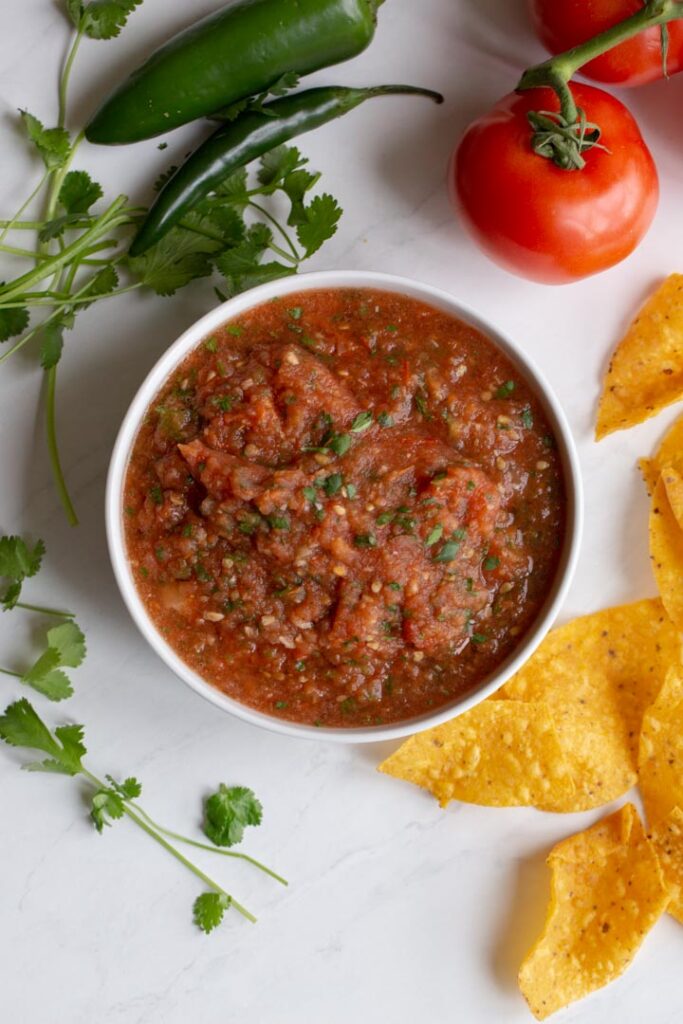 roasted red salsa in a bowl on a table
