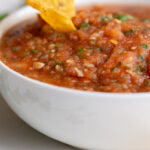 A simple and easy roasted red salsa that's perfect for Taco Tuesday, and some tips to help you make the best homemade salsa ever!