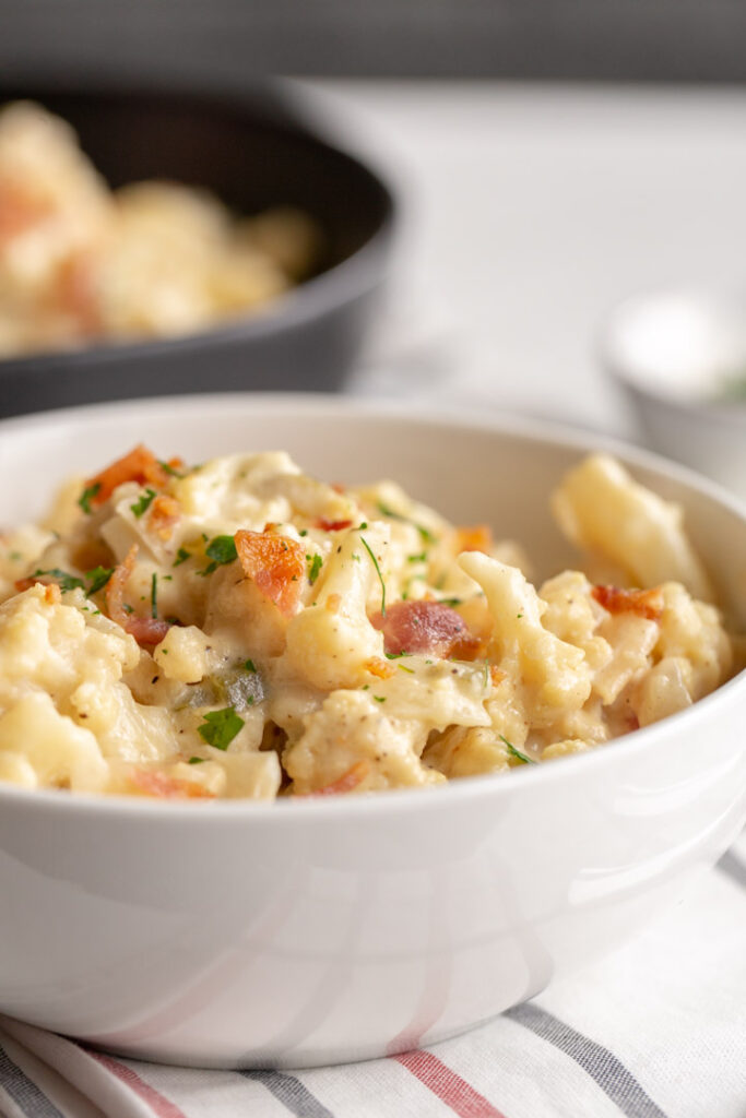bacon jalapeno cauliflower mac and cheese in a bowl