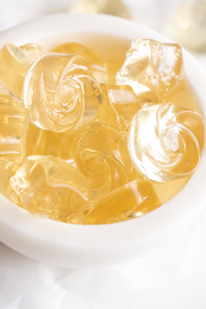 champagne gummies in a bowl