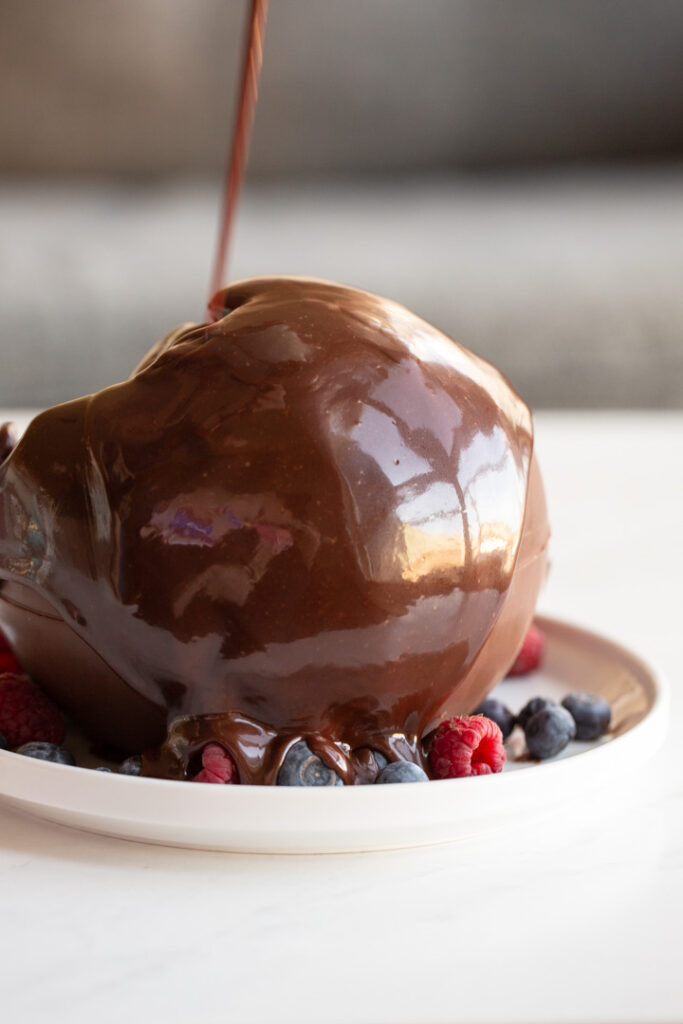 chocolate ball dessert melted with hot fudge