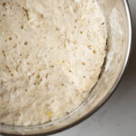 The best pizza needs the best pizza dough. This yeasty pizza dough recipe is soft and chewy with a crispy edge and requires very little kneading!