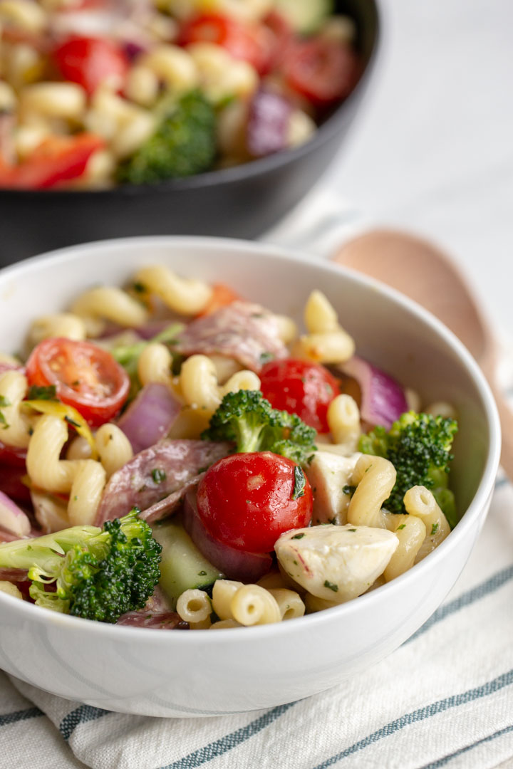 Italian Pasta Salad with cavatappi pasta, tomatoes, broccoli, cheese and salami