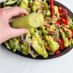 This creamy avocado lime dressing is super light and refreshing, and packed full of flavor! It's great on salads, or keep it thicker for dips and using on tacos.