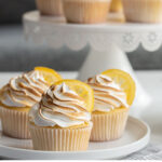 Delicious vanilla cake and a lemon marshmallow frosting make these amazing lemon meringue cupcakes. Top it with a candied lemon and your guests will fall in love!