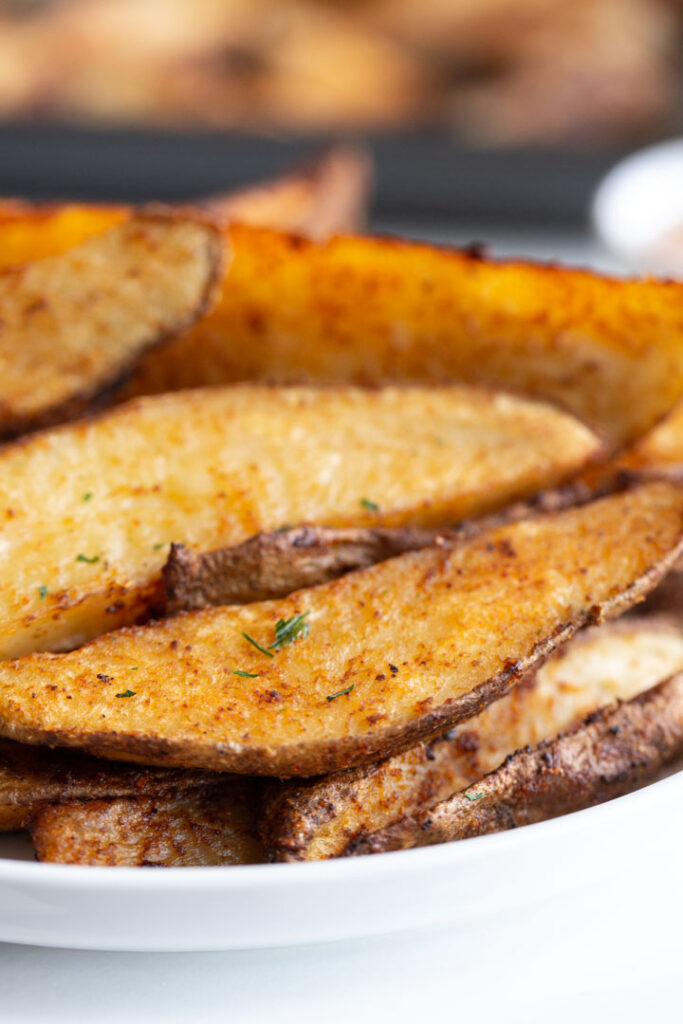 seasoned potato wedges on a plate