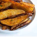 Flavors like garlic, onion and paprika make these awesome roasted seasoned potato wedges. They're easy to prepare and an instant hit at the table.