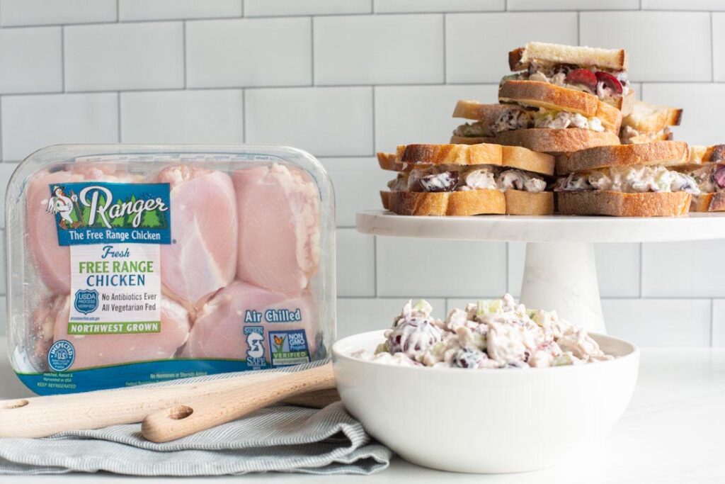 cherry chicken salad sandwiches on a stand