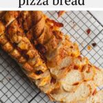 One bite of this soft and yeasty homemade pepperoni pizza bread is all you'll need to fall in love. Bursting with swirls of asiago cheese and shredded pepperoni, this bread is great for sandwiches, paninis, snacking and more!